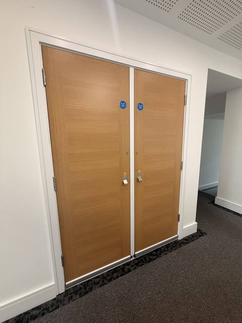 Communal fire doors with closer